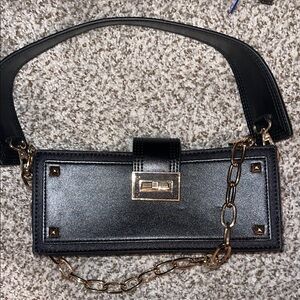 NWOT Elegant ALDO Black Handbag with Gold Chain
